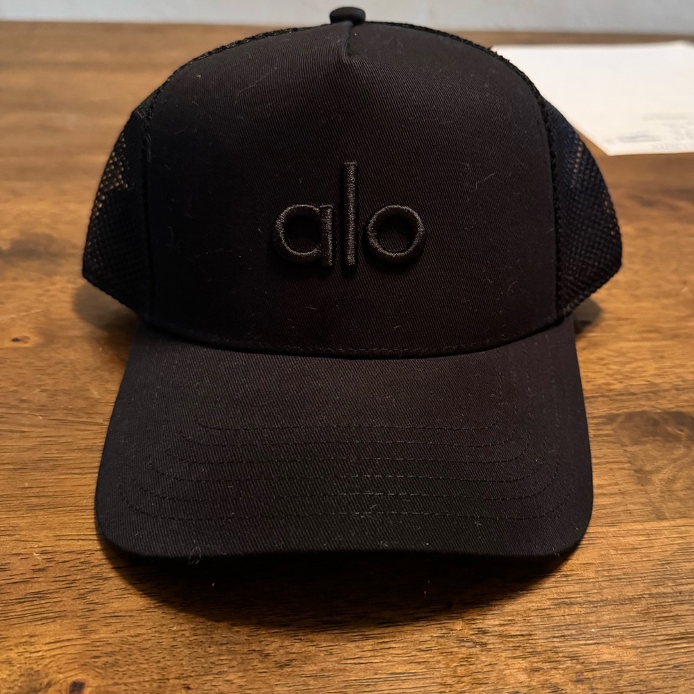 NWOT Alo Black Trucker Hat